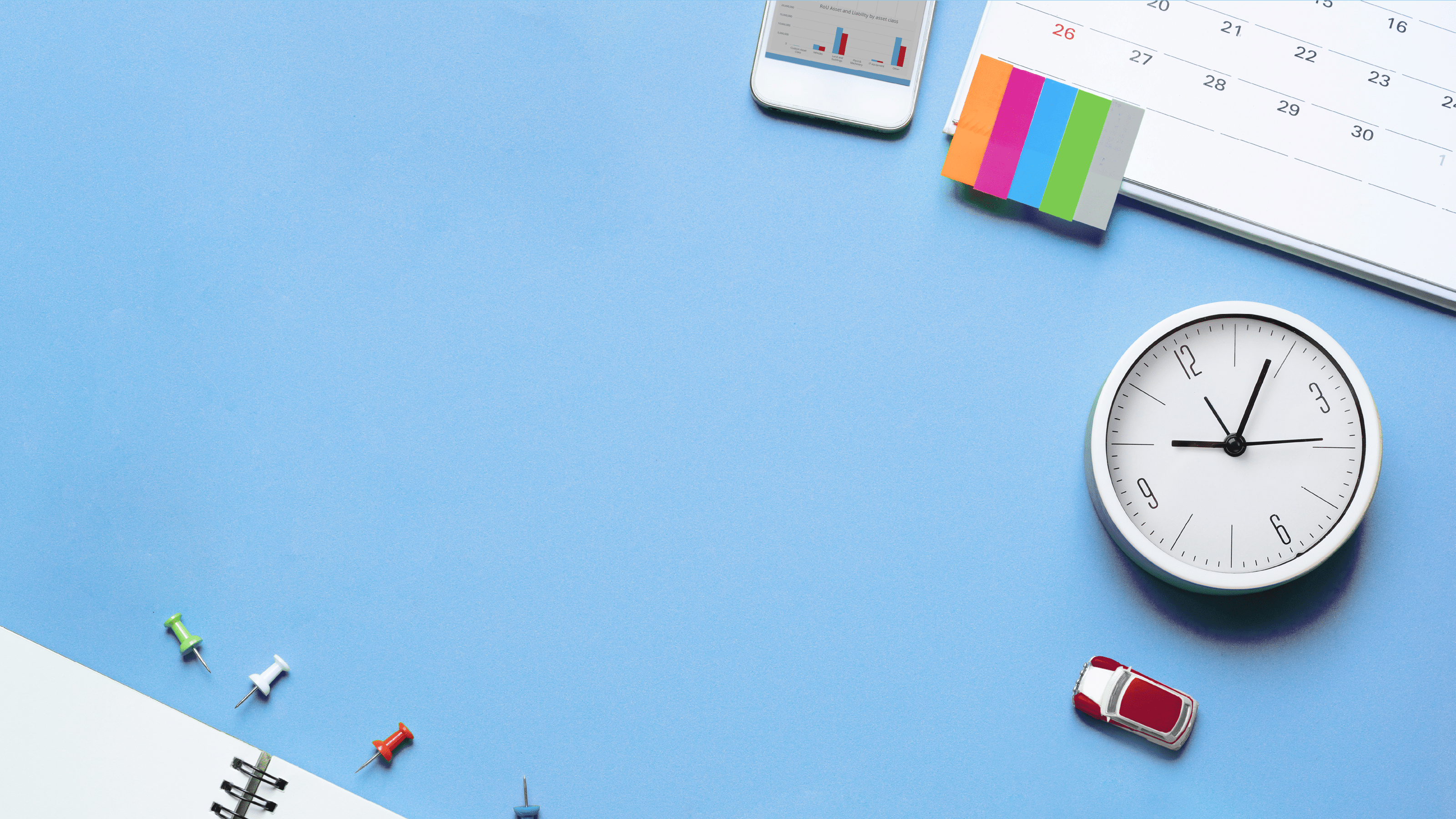 concept of travel vacation trip planning on green background, flat lay