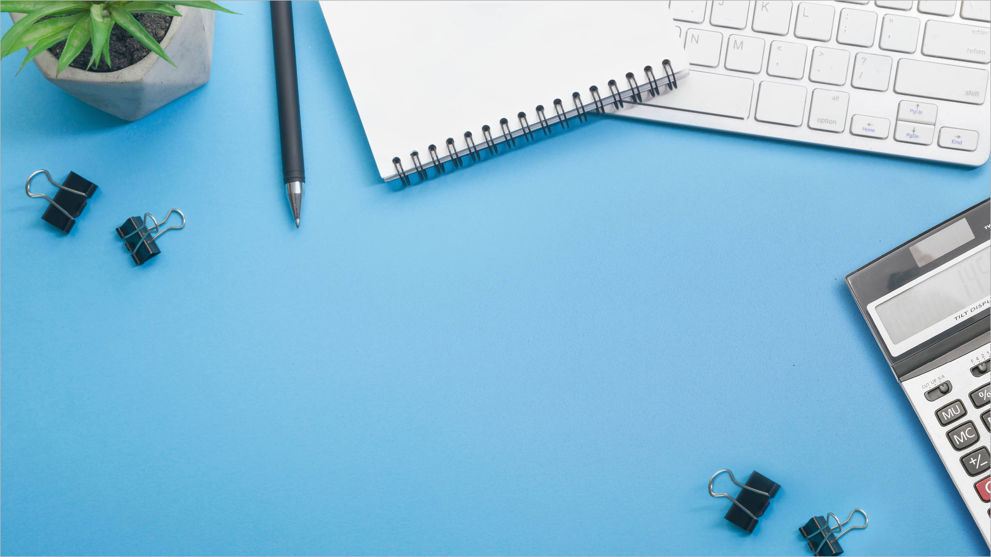 Blue desk office with laptop, smartphone and other work supplies with cup of coffee  Top view with copy space for input the text  Designer workspace on desk table essential elements on flat lay