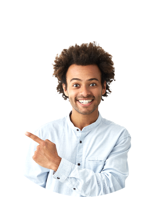 Horizontal portrait of dark-skinned handsome man having broad smile wearing formal white shirt posing against white background pointing with index finger at white copy space for your advertisment