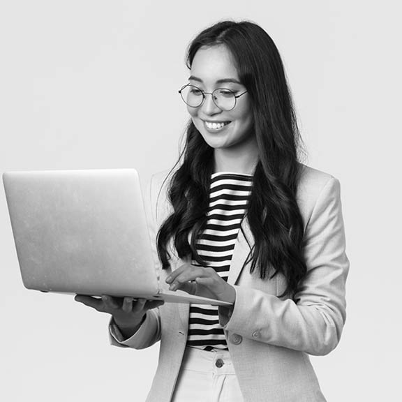 Business, finance and employment, female successful entrepreneurs concept. Professional stylish asian businesswoman fixing project on her way to office, using laptop standing whtie background