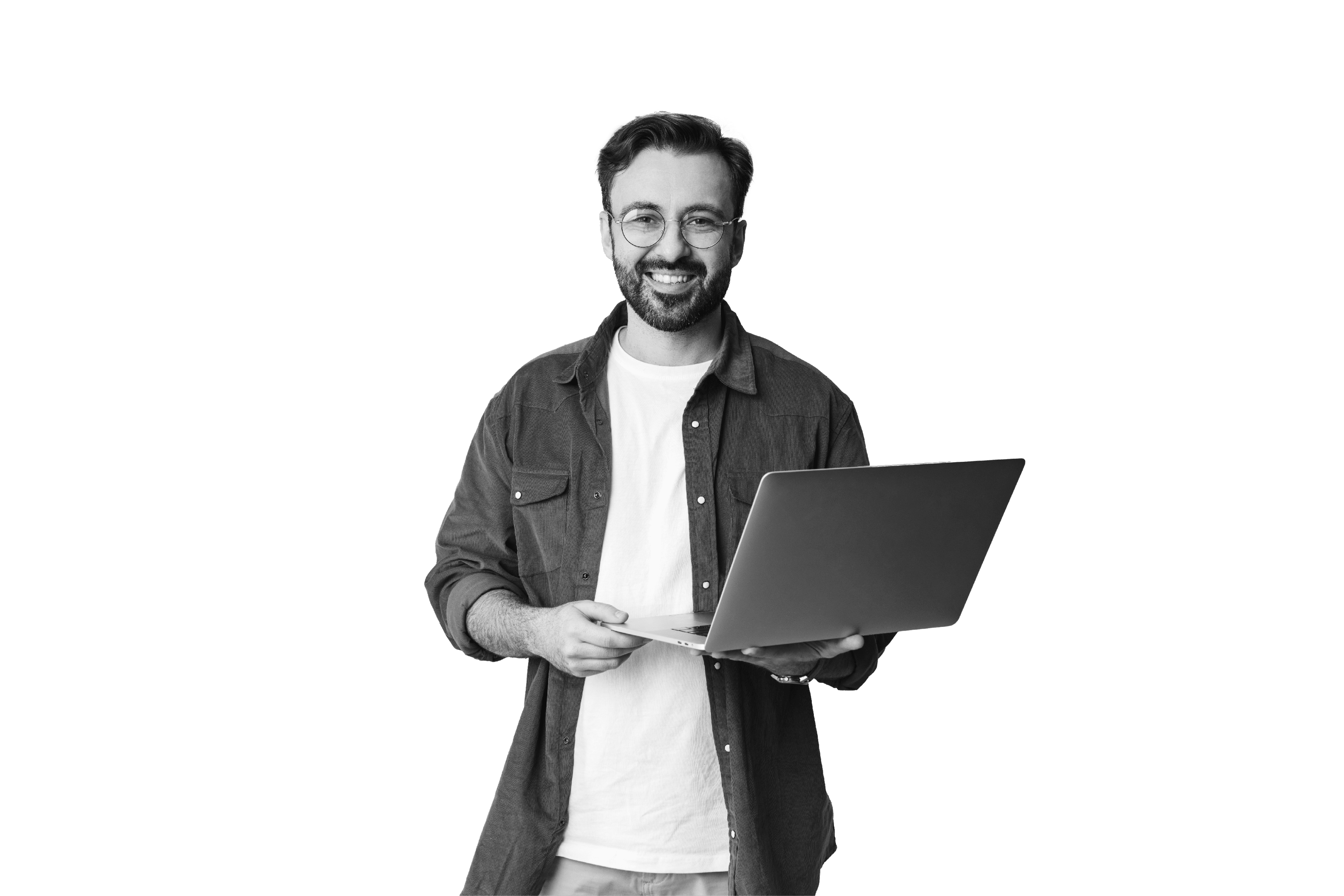 Image of a happy cheery optimistic young unshaved man isolated over beige wall background using laptop computer.