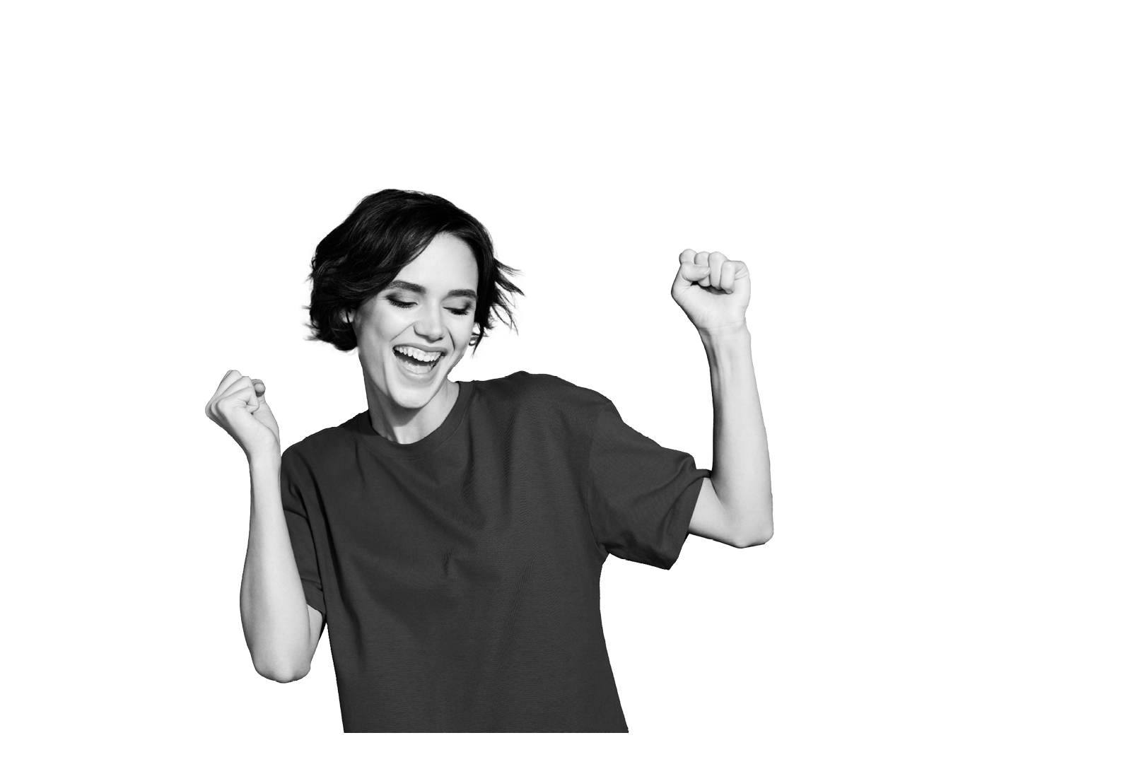 Photo of lucky funny young lady dressed casual t-shirt smiling rising fists isolated green color background