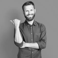 Photo of good looking men dressed trendy clothes arm direct empty space share info barbershop price isolated on yellow color background