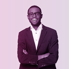 Happy african american young businessman in formal suit wearing eyeglasses portrait. Smiling millennial confident black guy posing for photo, looking at camera, isolated on grey studio background.