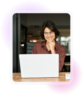 Professional working on a laptop in an office