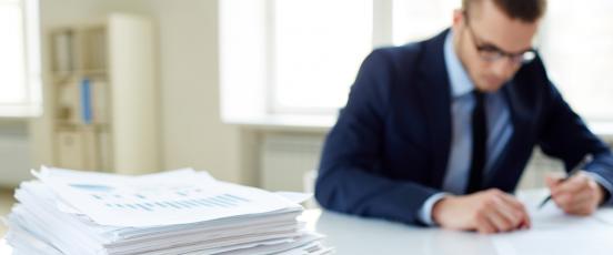 Man stressed about paperwork