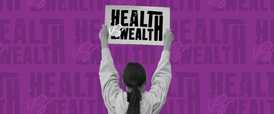 a lady holding up a banner, 'health is wealth'.