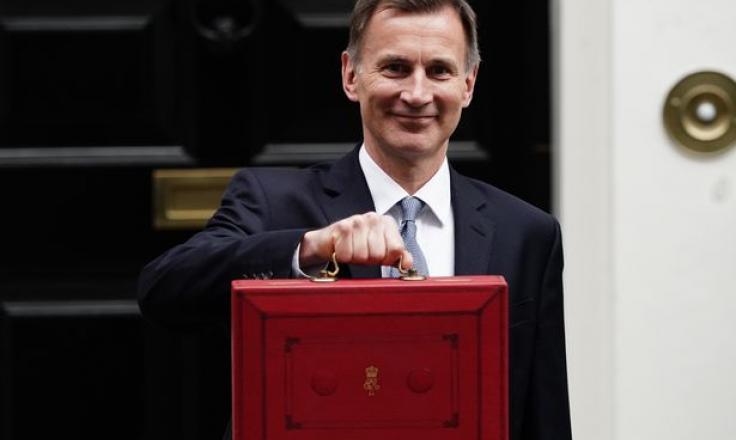 Jeremy Hunt, Chancellor of the Exchequer, holding the 2023 Budget