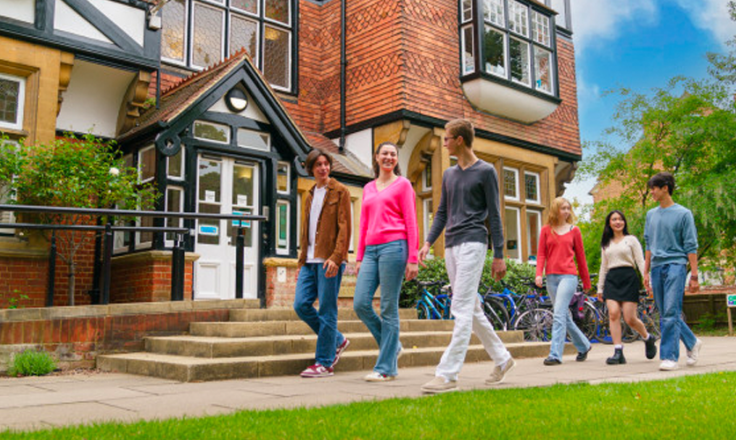 Students walking on campus at St Clare's, Oxford