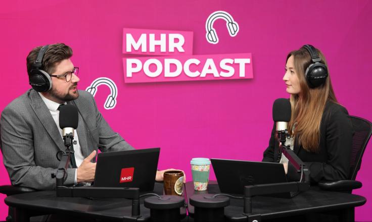 Andy and Alice sat with MHR podcast displaying behind them.