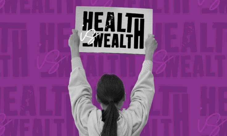 a lady holding up a banner, 'health is wealth'.