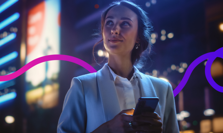 Image of a woman holding an iPad. 