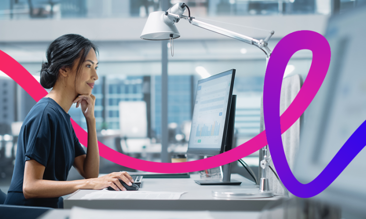 woman working on a desktop computer