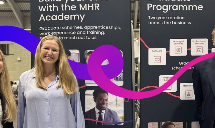 Three MHR graduates at a university careers fair