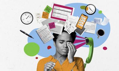 A woman looking stressed at the thought of payroll admin