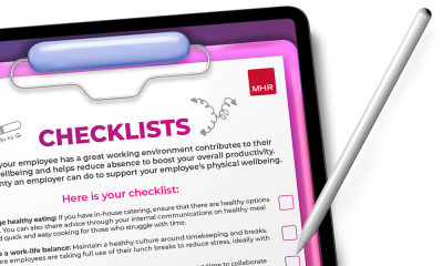 Employee wellbeing checklist pack on a clipboard