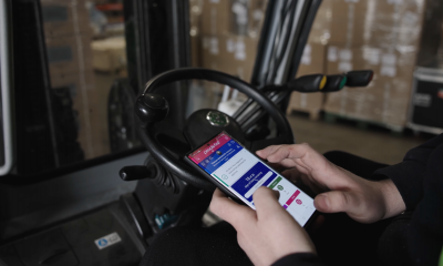 Cardinal Global Logistics employee using People First on their mobile phone