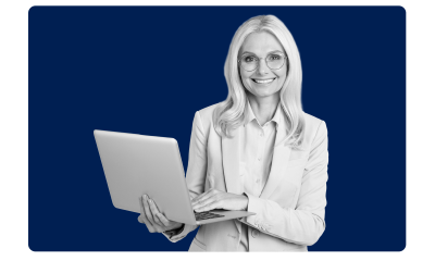 Woman on her laptop smiling at the financial planning platform that's integrated with MHR software systems.