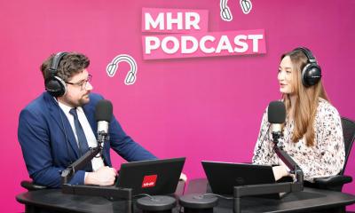 Andy and Alice sat with MHR podcast displaying behind them.