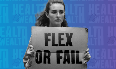 Woman holding sign that say flex or fail