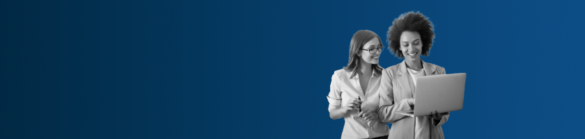 Blue shallow hero banner with two ladies smiling looking at a laptop