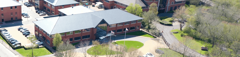 MHR campus, multiple buildings in an industry park.