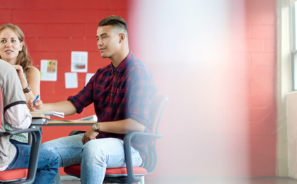 man working at desk in office