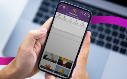 People First newsfeed showcased on iPhone at an employee's desk