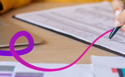 woman typing and writing