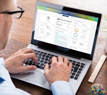 Man working on laptop, People First profile overview