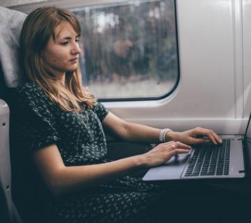 Worker on train as part of growing mobile workforce