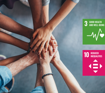 hands in the centre with sdg logos
