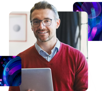 a man smiling holding a laptop, checking his pay in real-time.