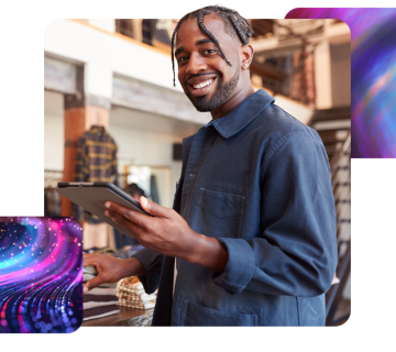 Retail worker smiling as he accesses People First on his work tablet