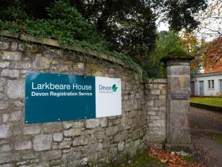 Sign to the entrance of Larkbeare House 