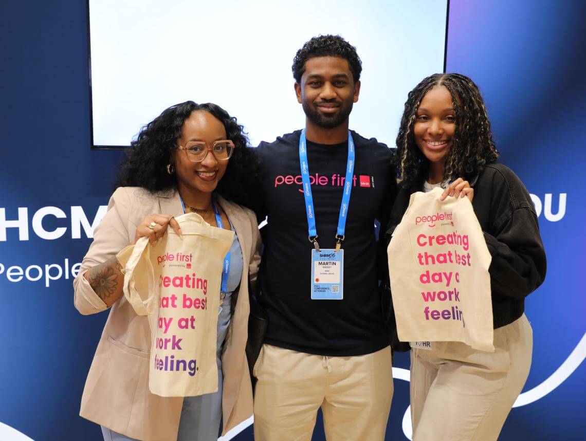 MHR staff with 2 women at SHRM26