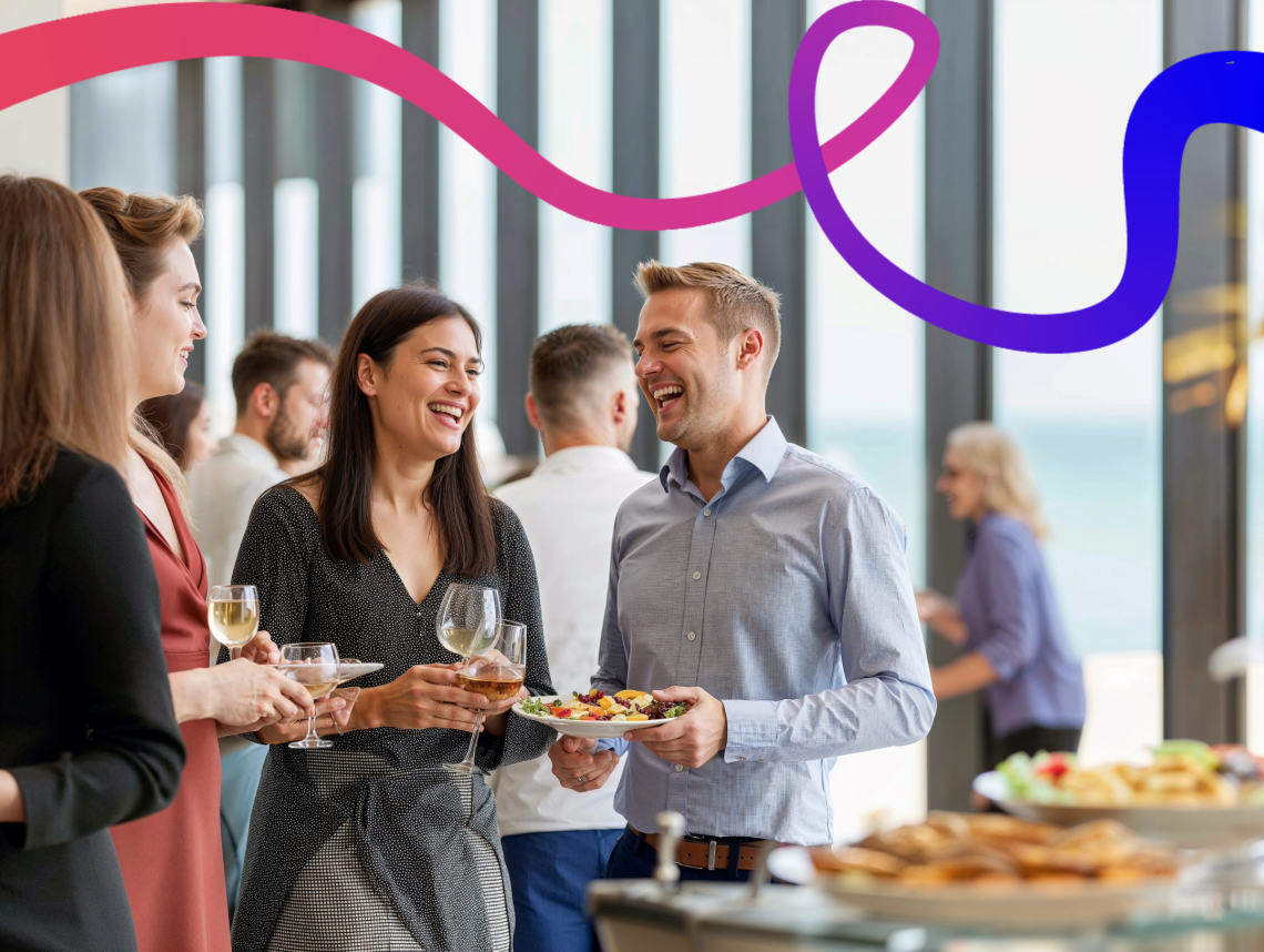 A group of work colleagues  with wine and food