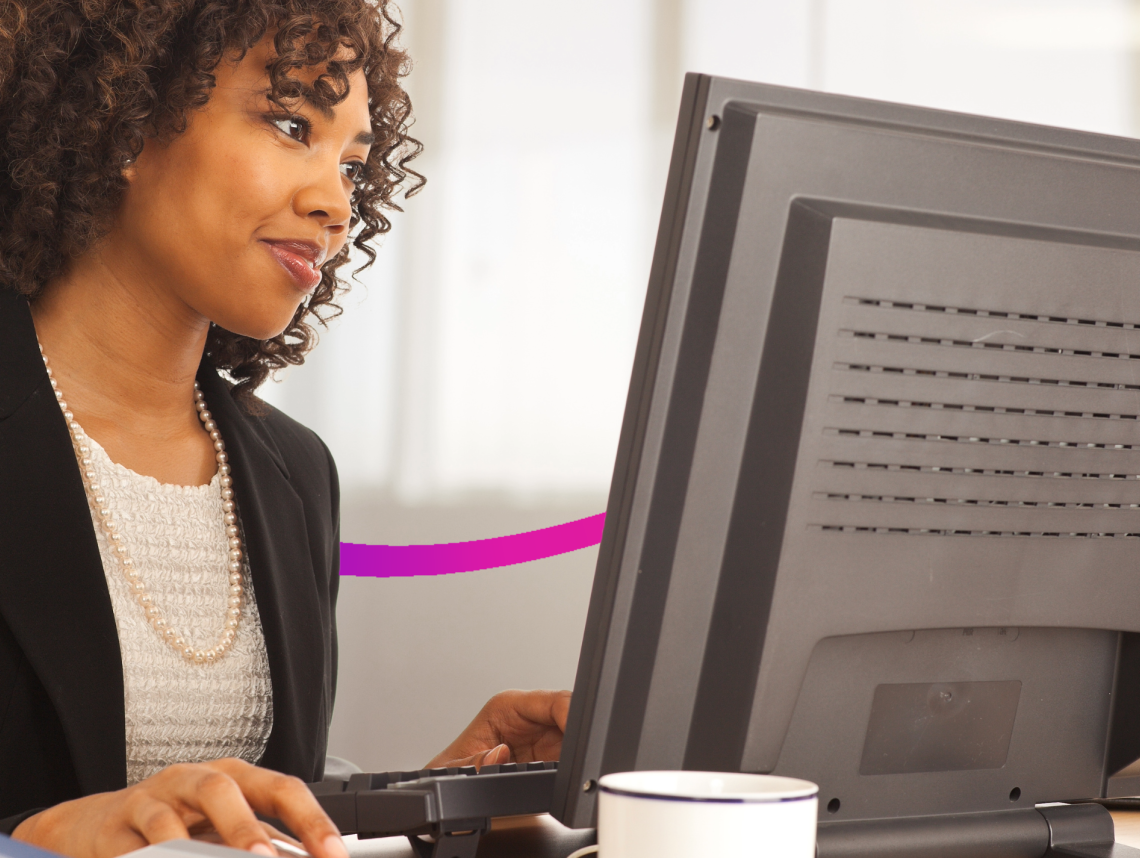 woman in an office using a computer