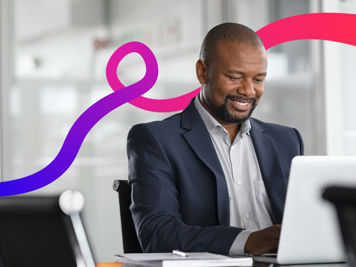 Man at his desk on a laptop