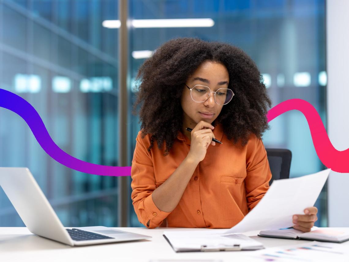 female employee looking at papers