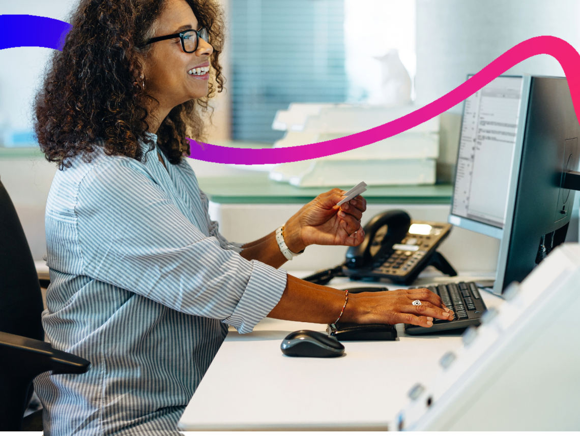 Local council worker in office on computer