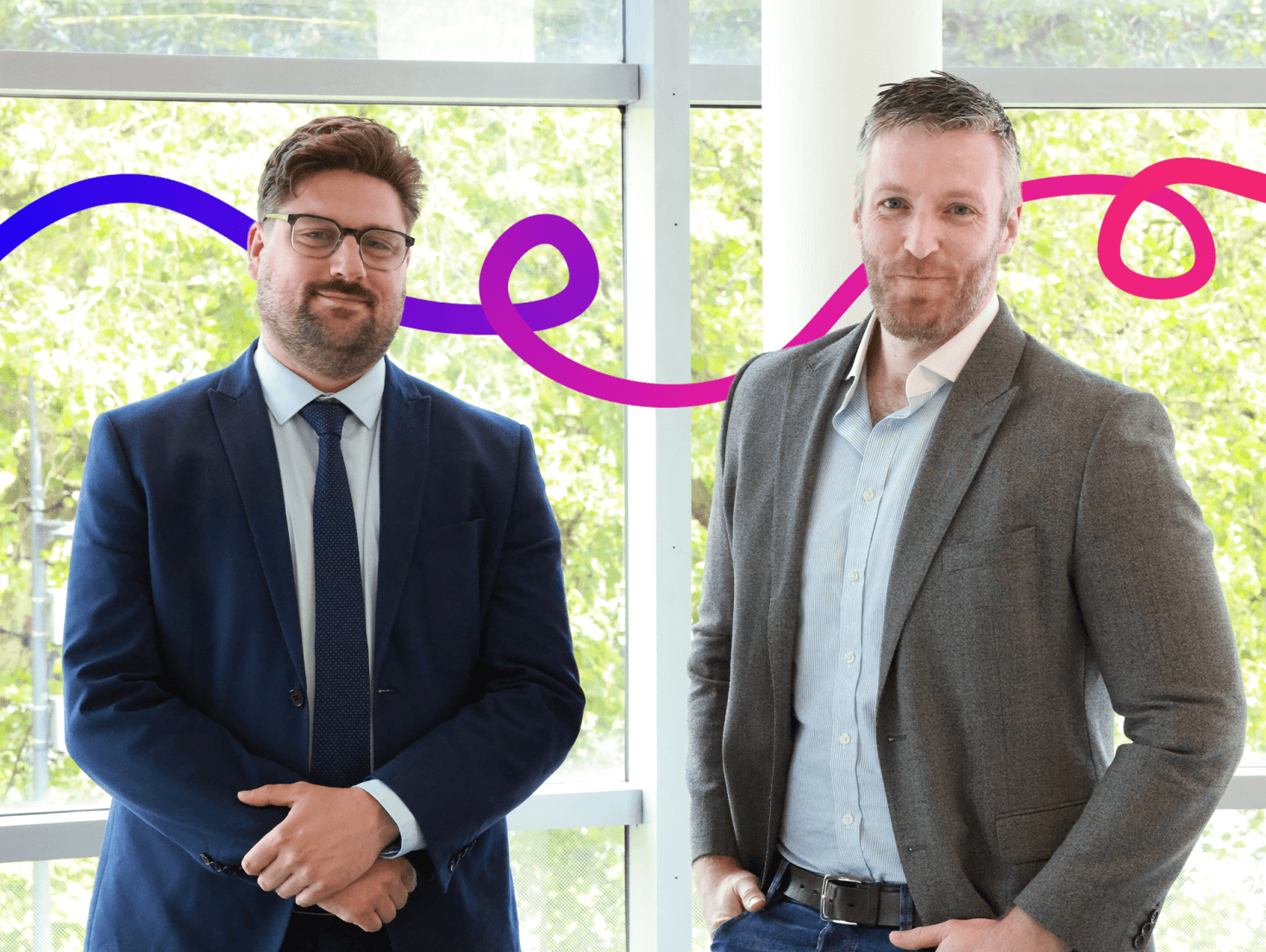 Andy Fowler and Ben Cooper, two men in suits.