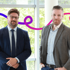 Andy Fowler and Ben Cooper, two men in suits.