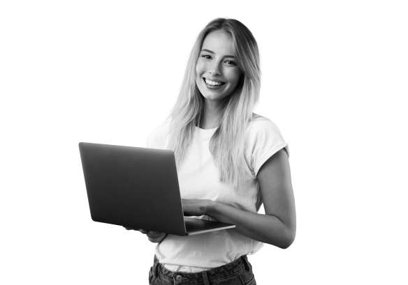 A lady smiling holding a laptop, happy after using MHR's cloud services to improve her data strategy.