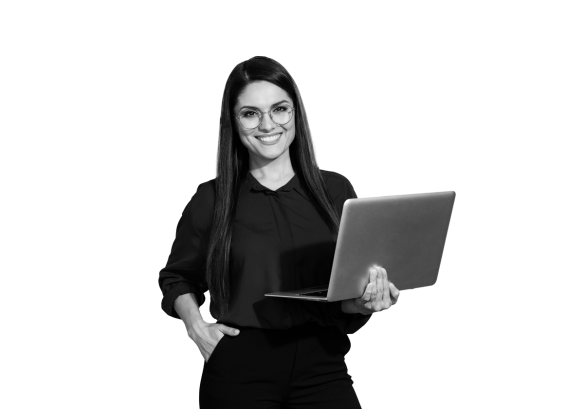 A lady smiling with a laptop.