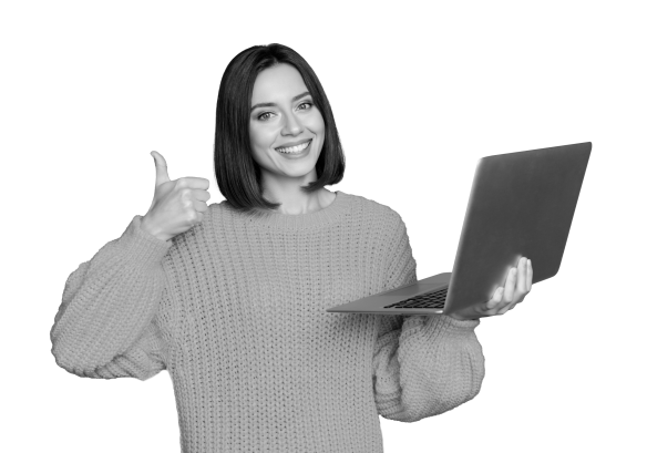 Woman smiling with laptop as her outsourced payroll software has left more time to focus on growth of the business