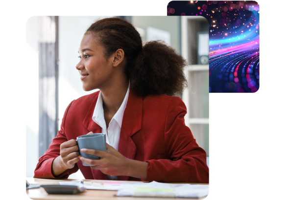 woman in red blazer holding mug and listening