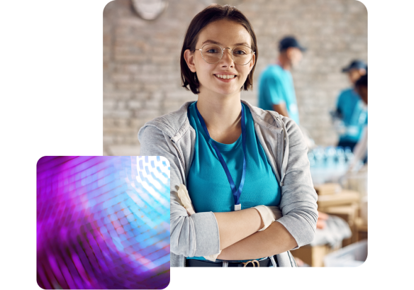 woman in blue top with arms folded