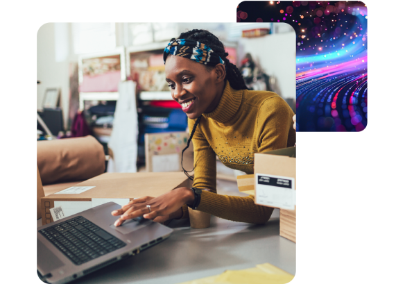 woman working on laptop in busy envirnonment