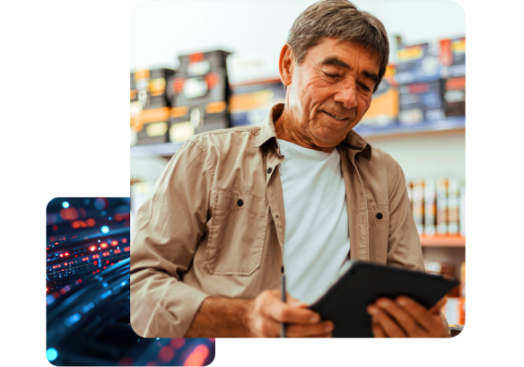 Hardware store worker accessing his People First Payroll information with ease on his tablet